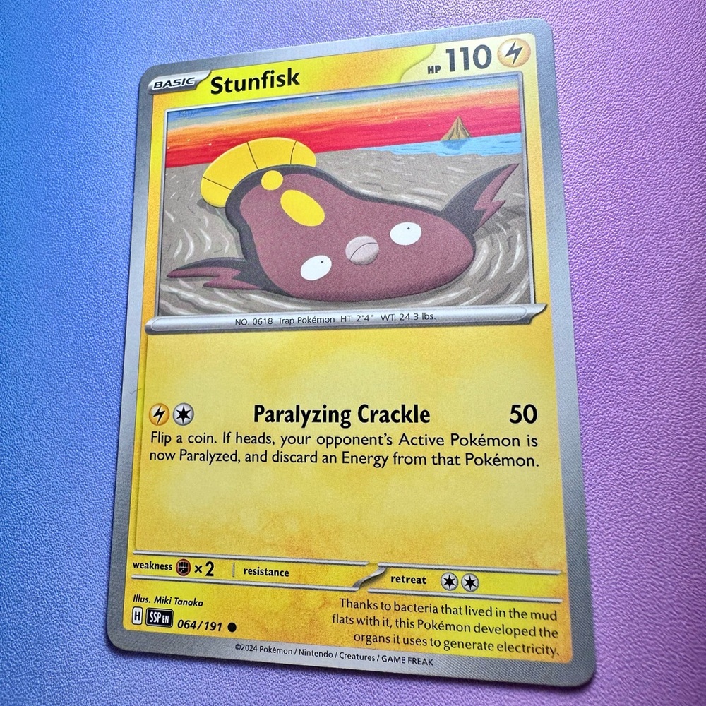 stunfisk - 064/191 (common) — pokemon: surging sparks